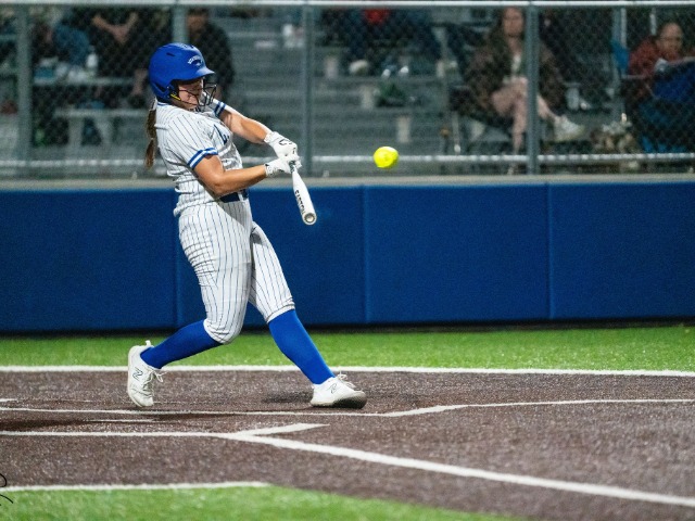 Kemp Homers Twice to Power Lady Roos Over Trinity