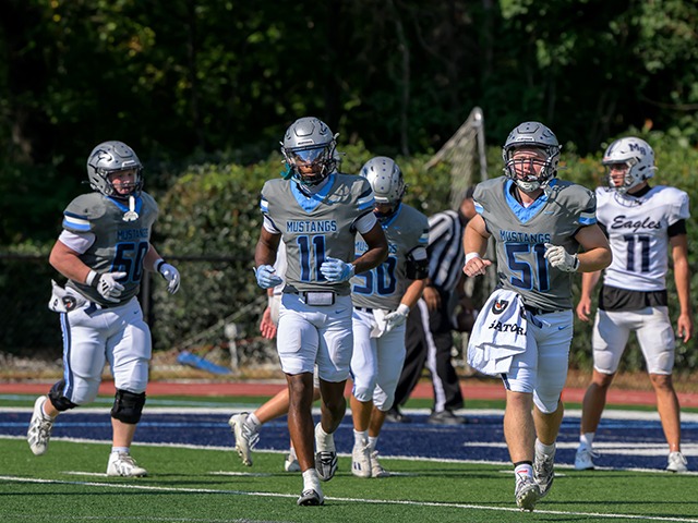 Varsity Football Claims Region Win Over King's Ridge, 42-16