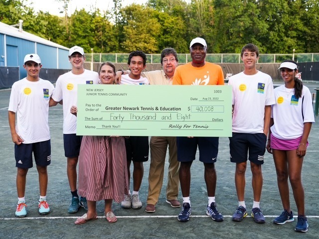 Tennis Team Members  Facilitate Charity Tennis Event
