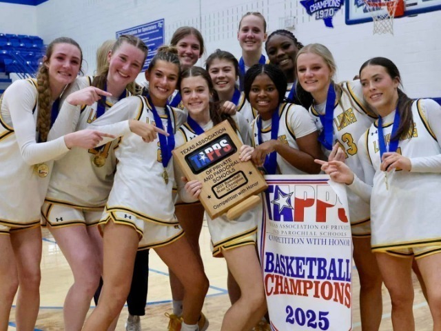 Prestonwood Christian Academy girls basketball team poses with 2025 TAPPS 6A state championship trophy and medals after title win