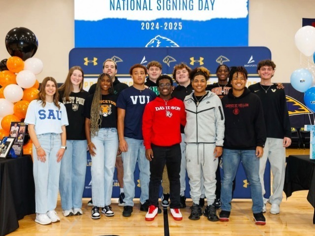 Prestonwood Christian Academy Plano celebrates 12 student-athletes in the gym as they sign Letters of Intent to play collegiate sports in 2025, includ