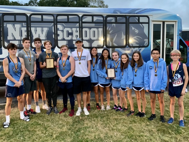 Cross Country Teams earn twelve medals and win the varsity boys and junior girls team awards.