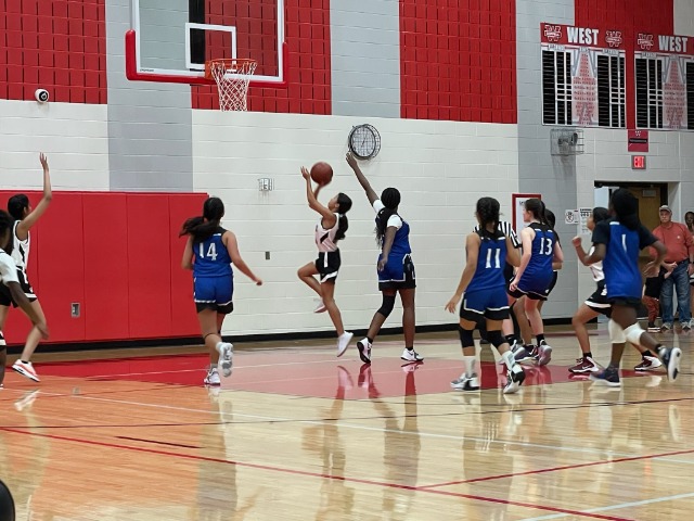 West 8th Grade Girls Open Basketball Season at Home