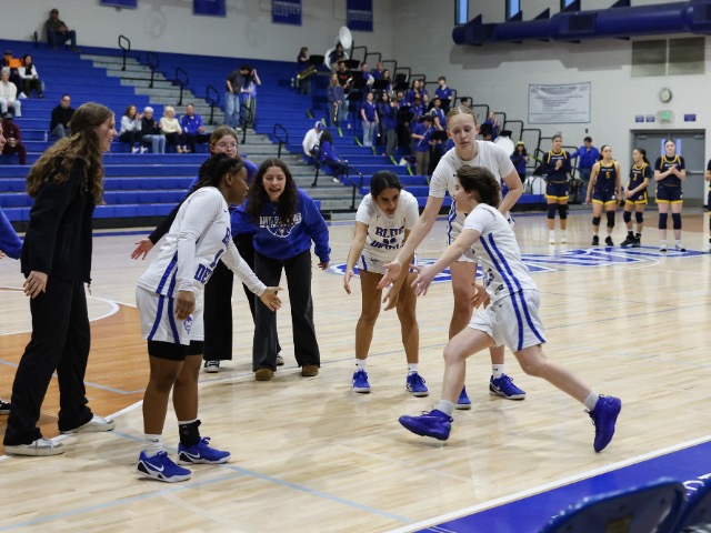 Blue Devils Lorelei Nachman greeted by teammates