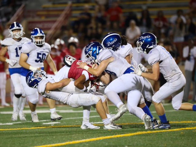 Brannon Hicklin pulls down a McClatchy runner Friday night.