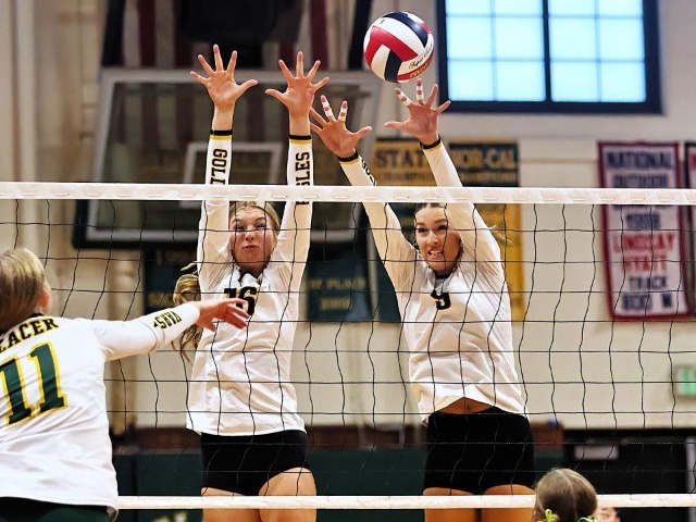 Del Oro's Aidyn Messerli (15) and Sydney Weber (9) block a kill attempt from Placer's Bri Donovan (11).