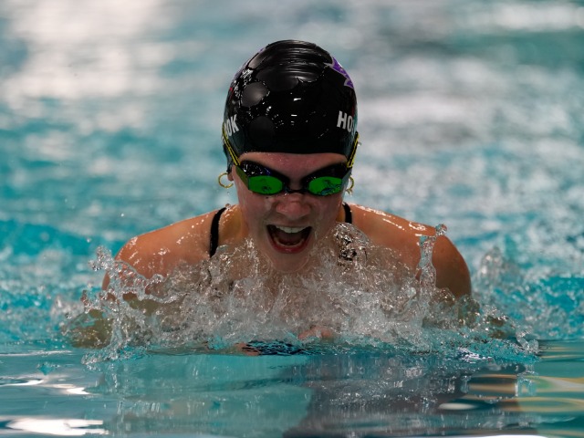 Grayson Littlejohn explodes off the block as he wins the 200 IM!