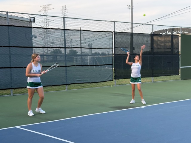 Gators Battle Through Long Delay to Improve to 3-0 in District Play