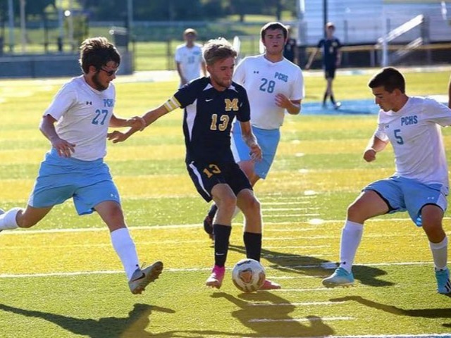 Marion soccer team gets first win