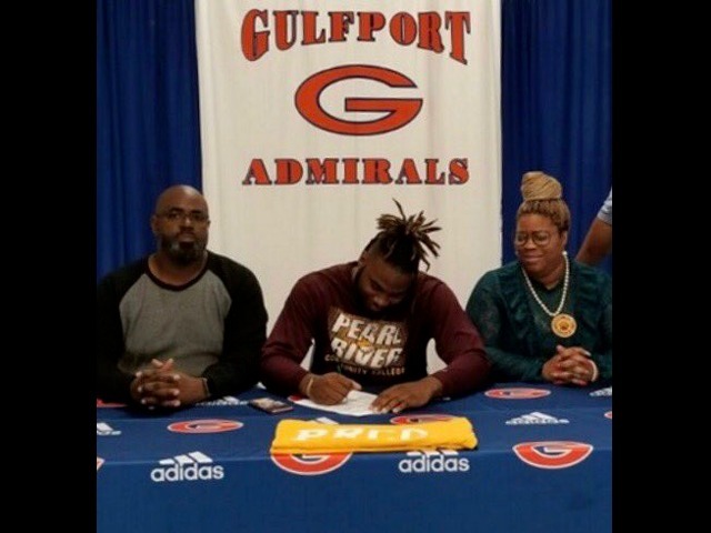 Tionne Frost signed a football scholarship with Pearl River CC
