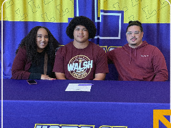 Isaac Norris and parents at signing