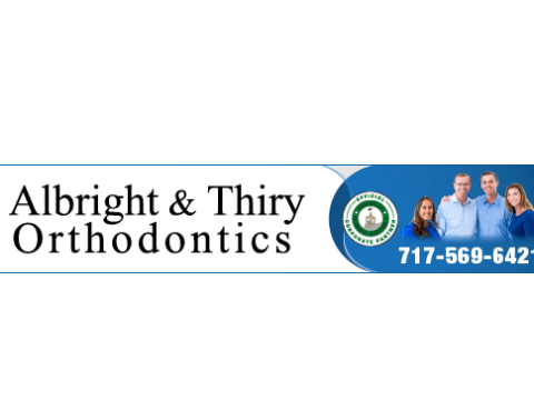Albright & Thiry Orthodontics logo