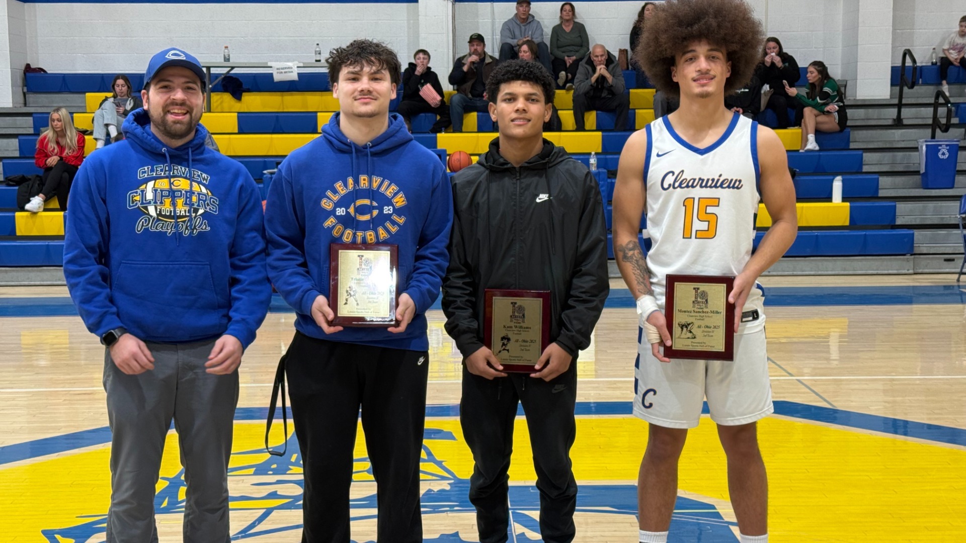 Slide 7 - Tristin, Kam, Montez, and Anthony are honored for All-State Football by Lorain Sports HOF