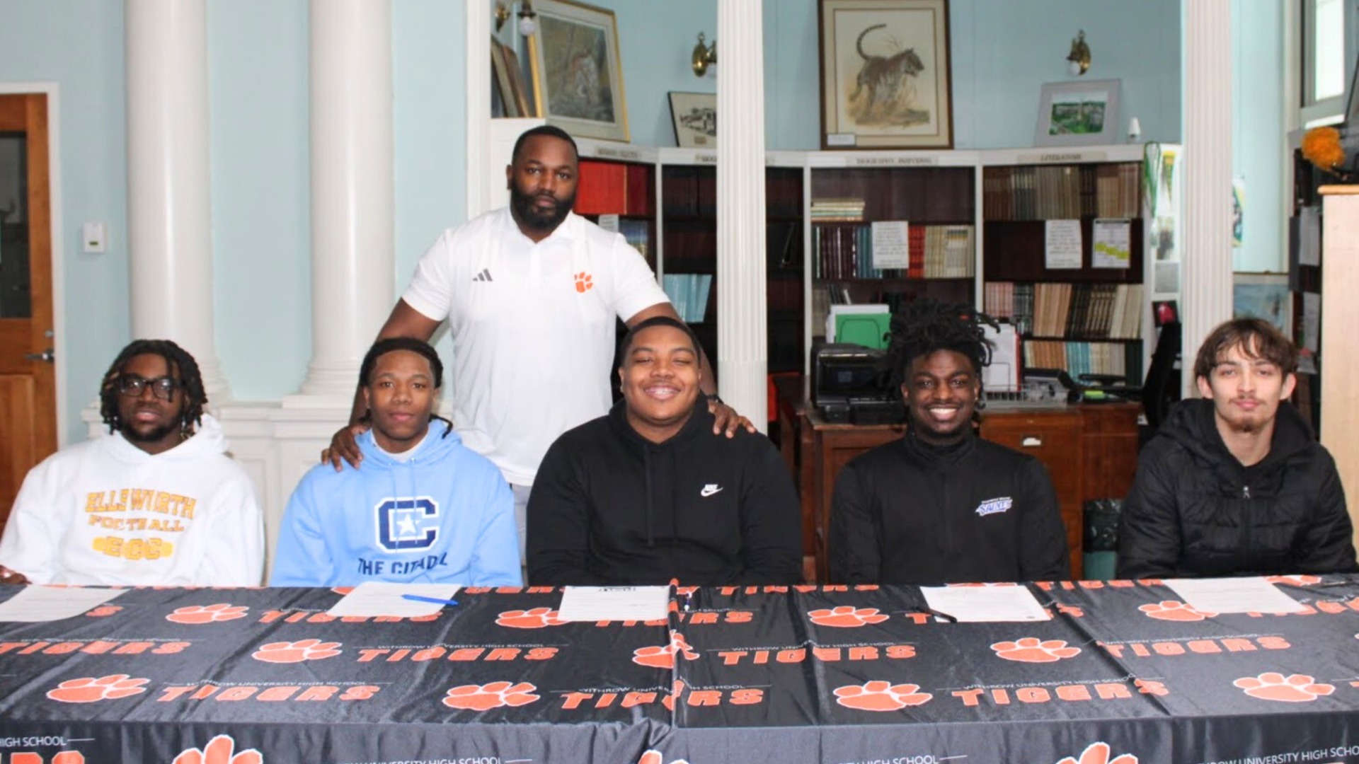 Slide 1 - Congratulations to our signed collegiate football athletes!