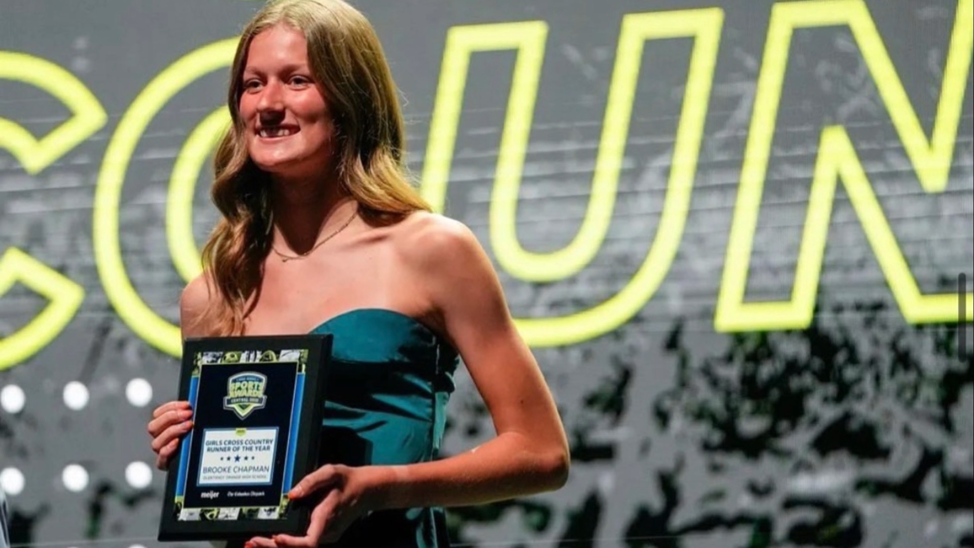 Slide 1 - Brooke Chapman: Girls Cross Country Runner of the Year, Awarded by Central Ohio High School Sports awards.