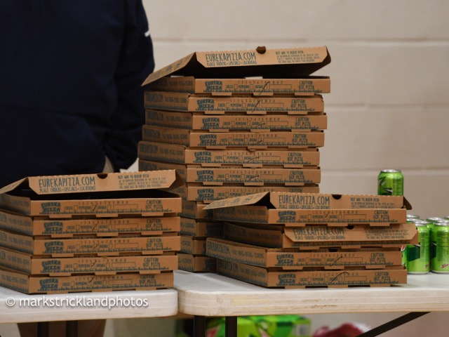 Serving Pizza to the student section for Basketball Game 1.25.19