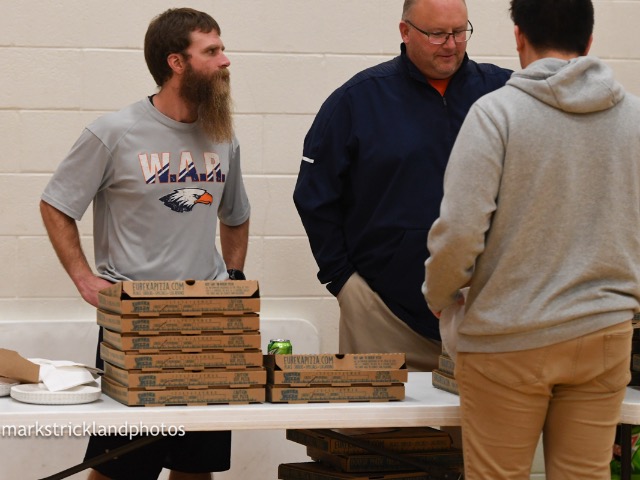 Serving Pizza to the student section for Basketball Game 1.25.19
