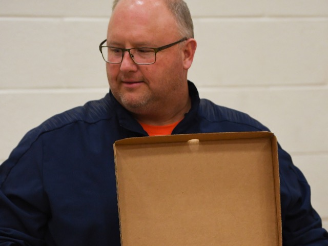 Serving Pizza to the student section for Basketball Game 1.25.19