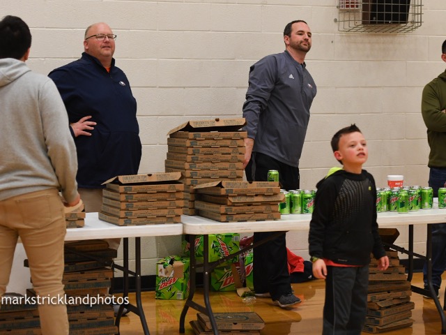 Serving Pizza to the student section for Basketball Game 1.25.19
