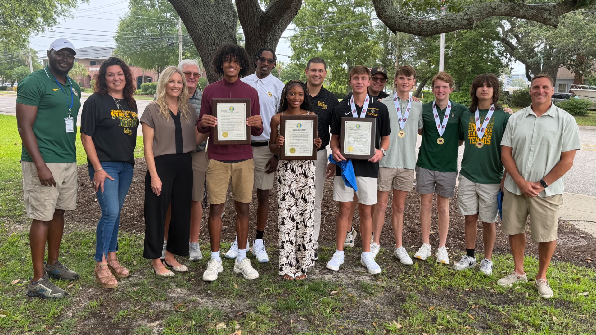 Slide 0 - Champions Honored By City Council