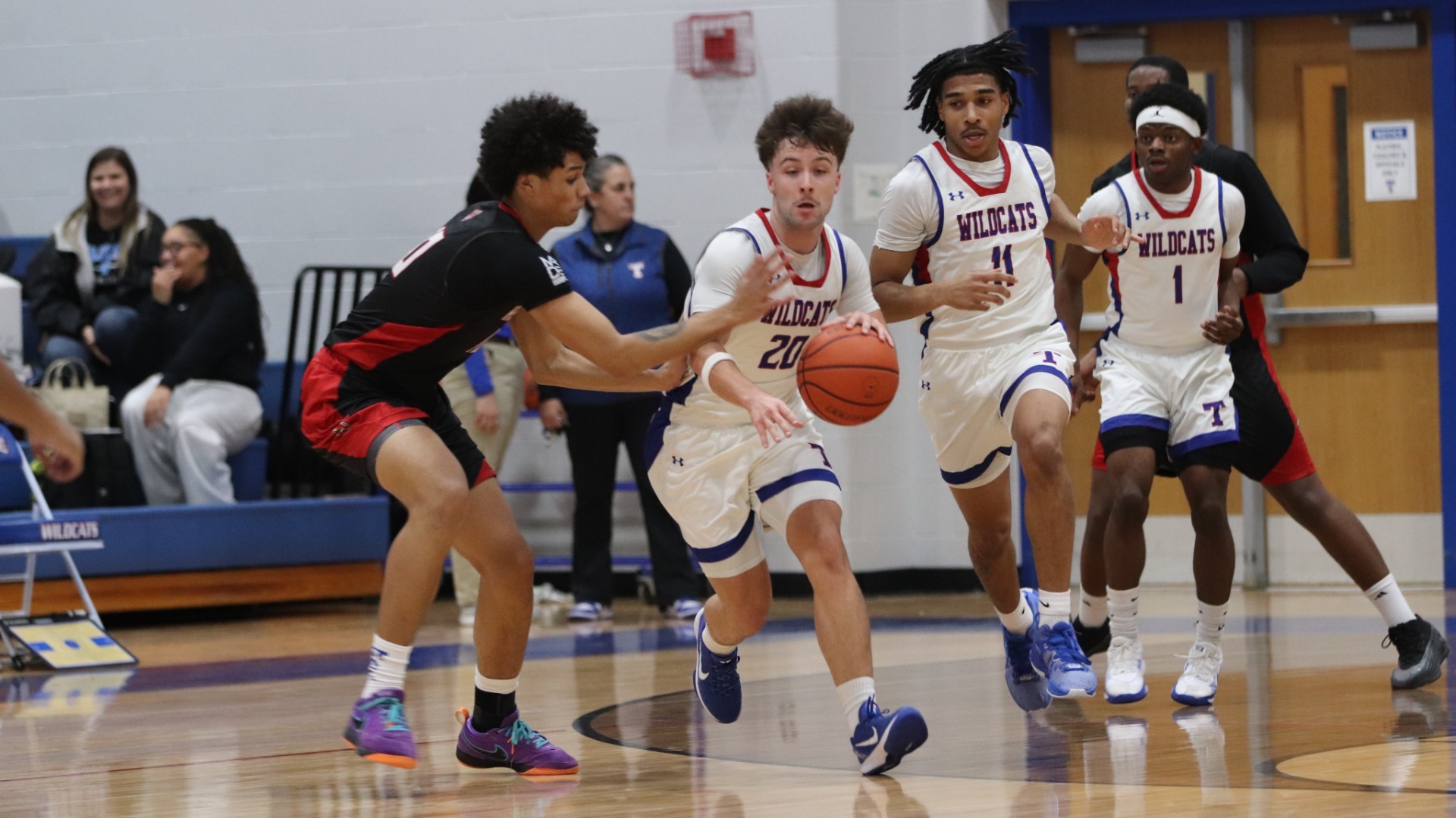 Slide 1 - First-place Harker Heights defeats Temple in 12-6A matchup, 64-47