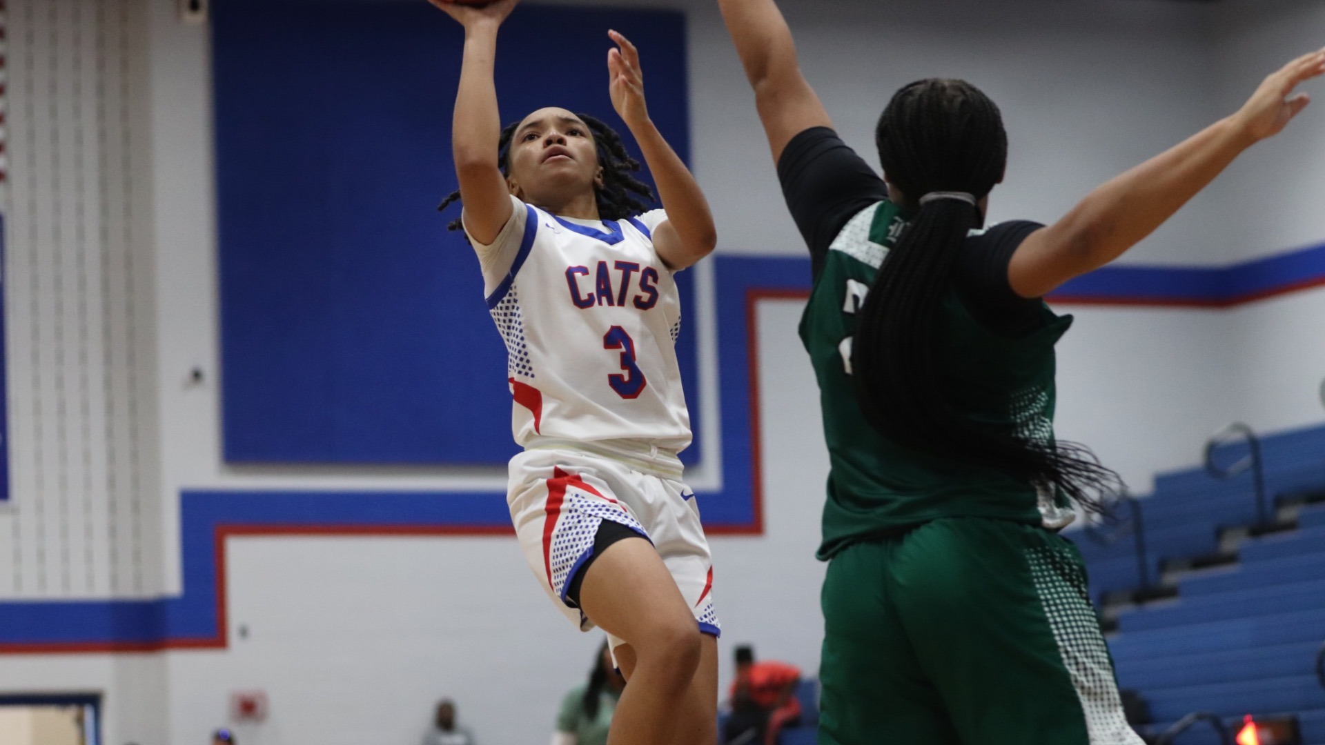 Slide 1 - Tem-Cats use solid second half to pull away from Rudder for 49-29 win