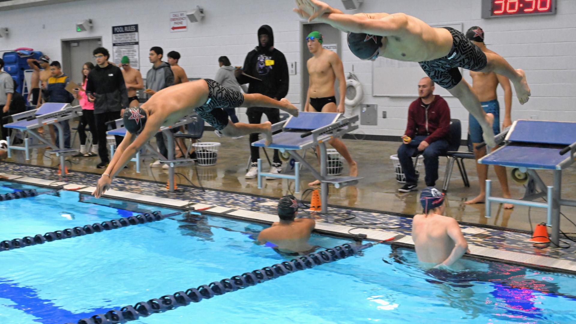 Slide 7 - Coppell Swim & Dive Wraps the Regular Season with Four Wins in Arlington