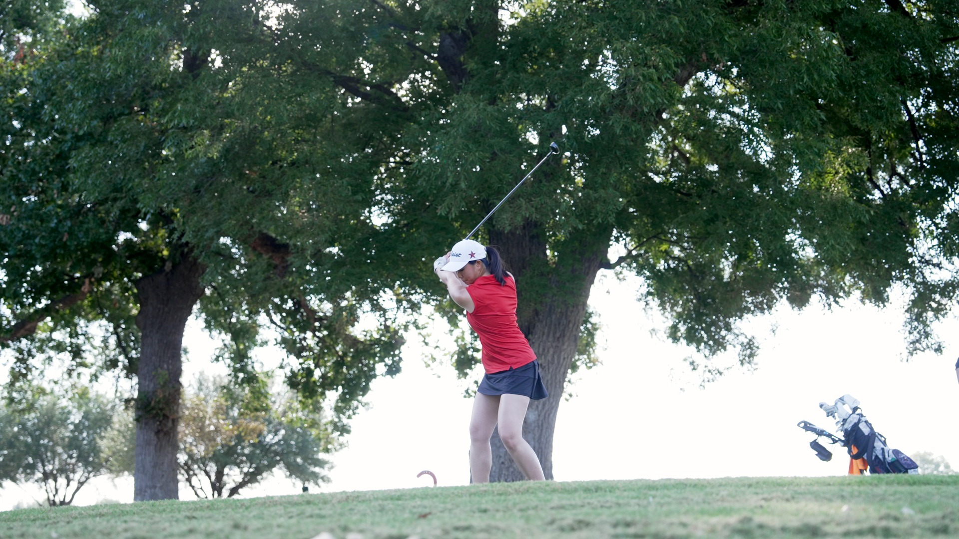 Slide 1 - Sabrina Tam Leads Coppell Girls Golf at LHS Farmer Pink Out Invitational 