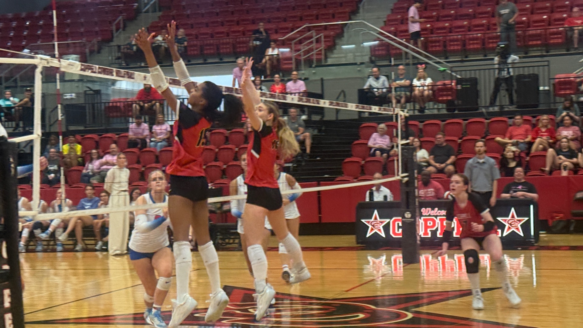 Slide 0 - Cowgirls Drop Tight Three-Set Match to Pearce