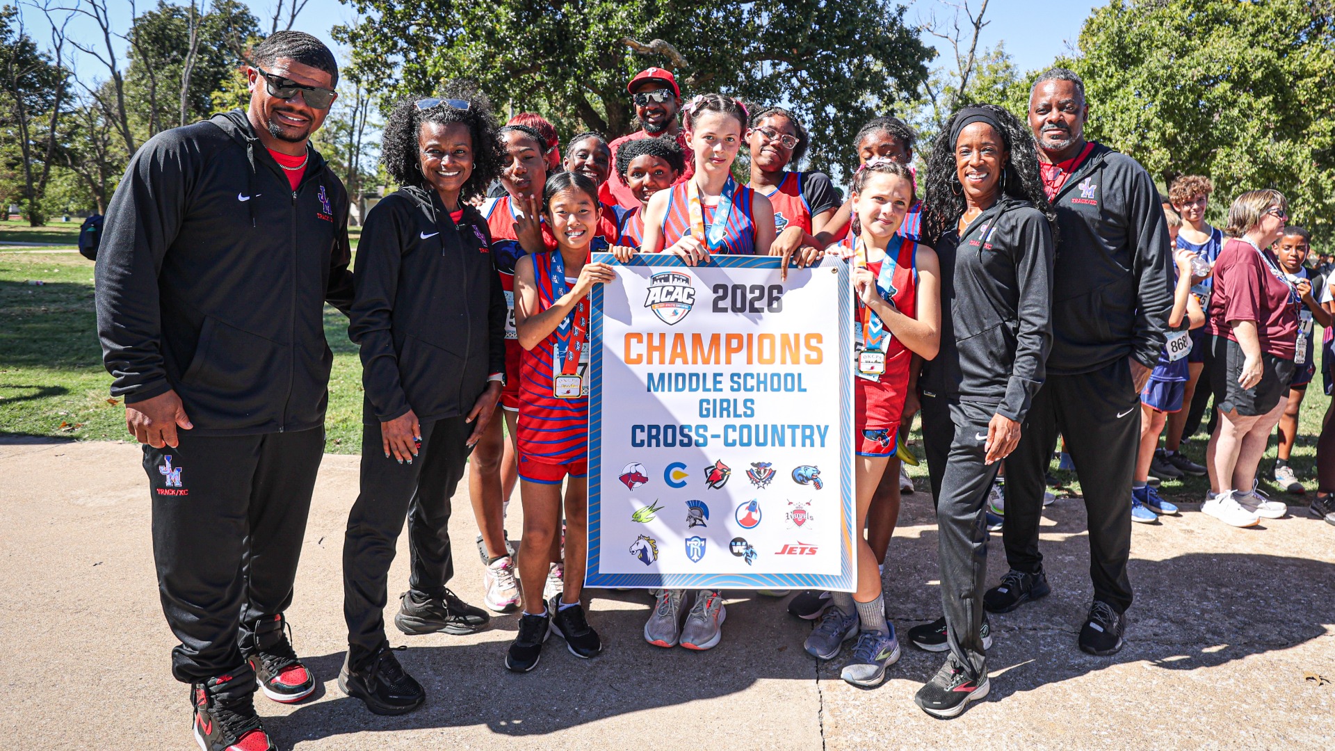 Slide 2 - John Marshall Middle School Girls Claim 2026 ACAC Middle School Girls Cross-Country Championship Banner
