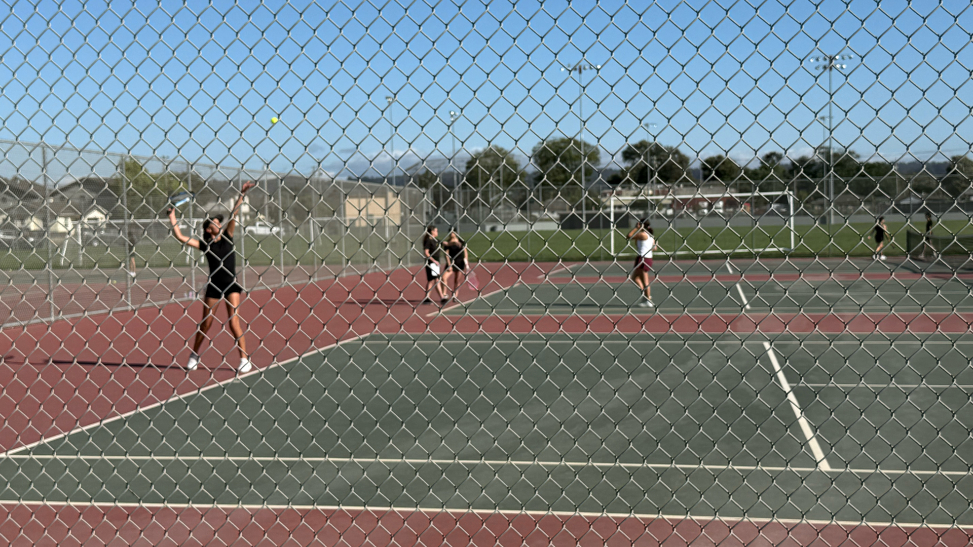 Slide 7 - Our Ladycatz Tennis Team in Action!