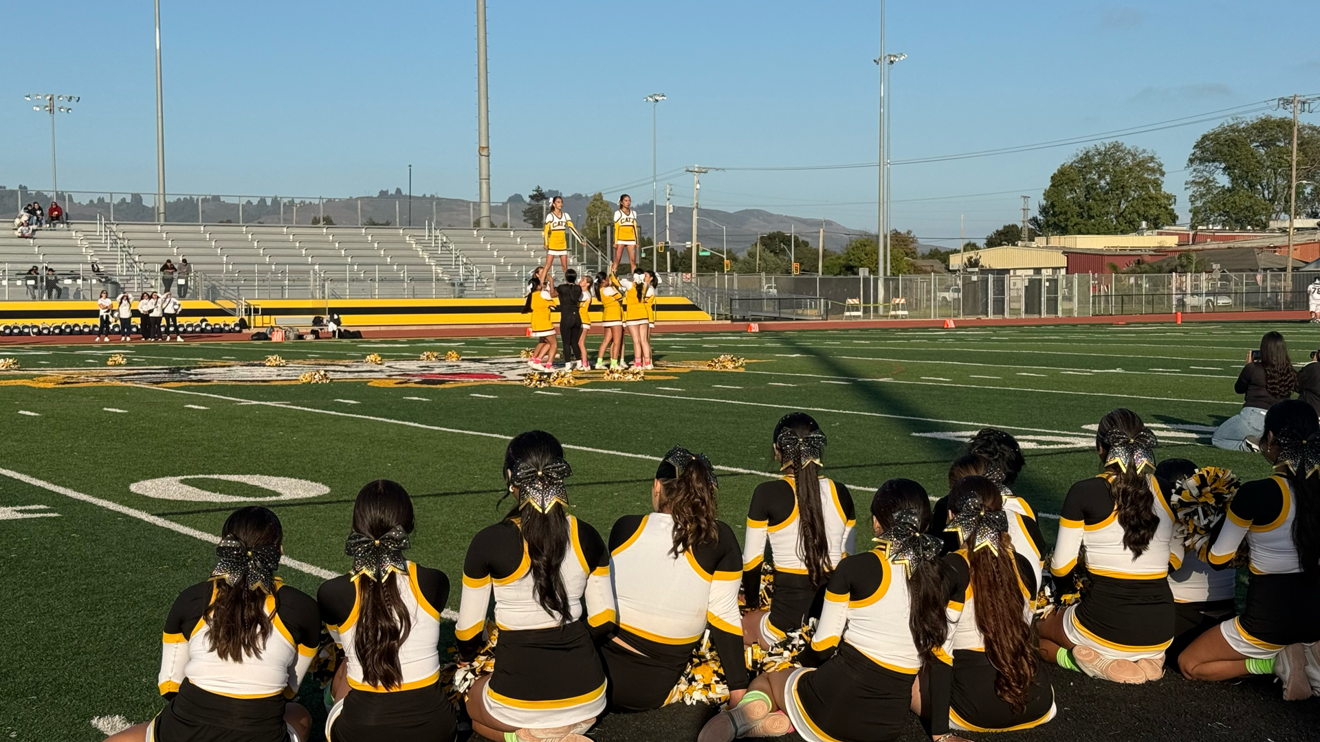 Slide 5 - Cheers to our Cheerleaders!!