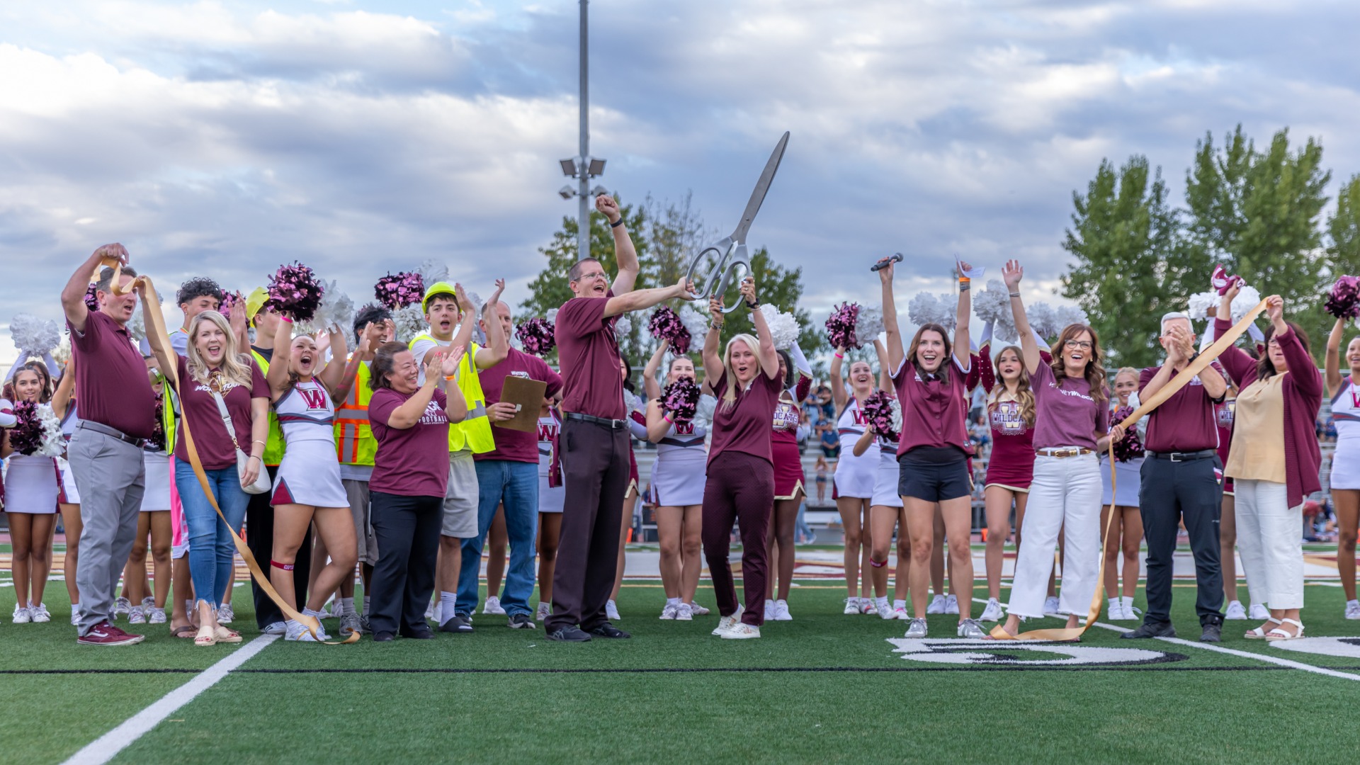 Slide 0 - Celebrating the new field turf with a ribbon cutting ceremony!
