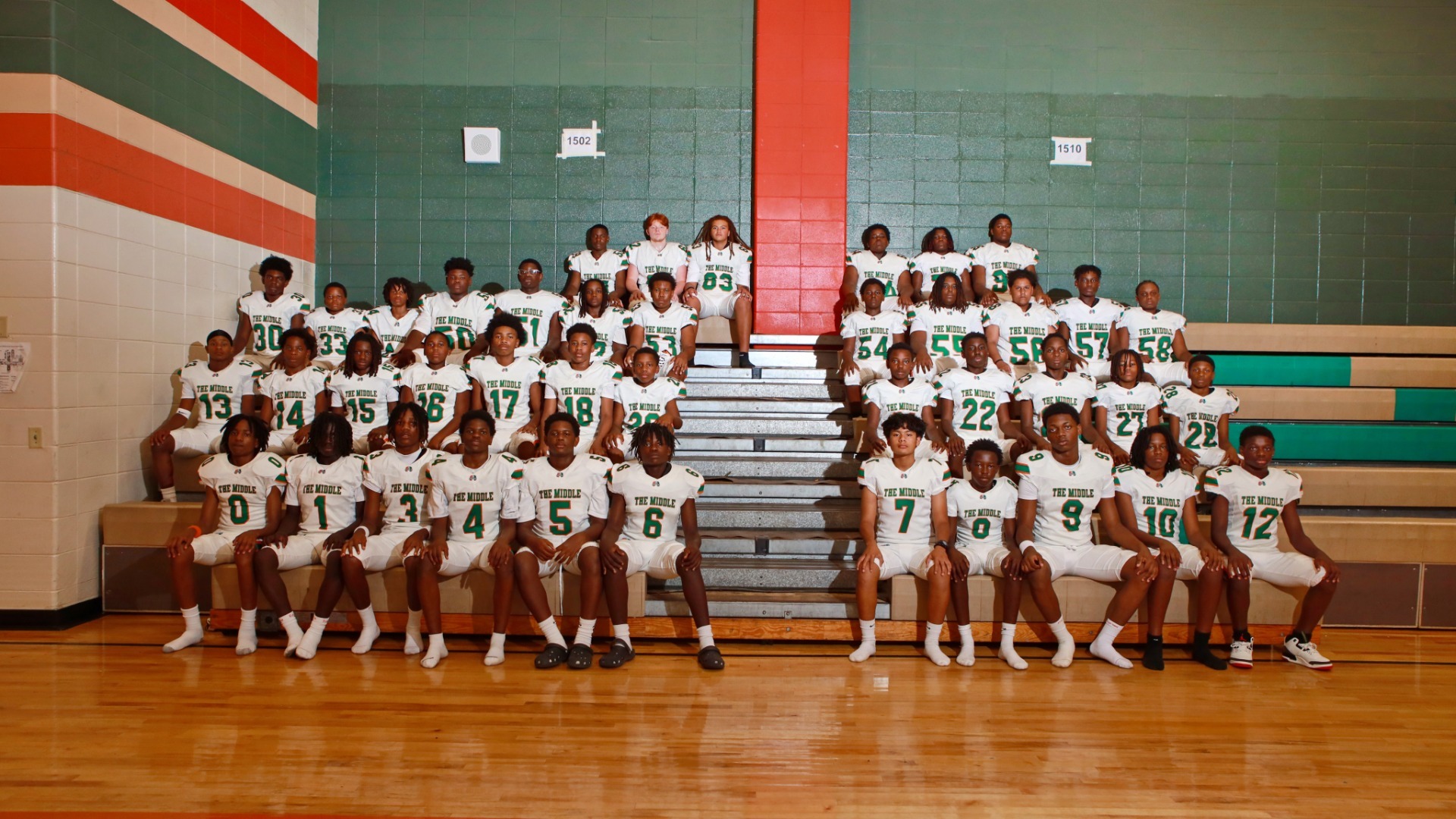 Slide 0 - AMS 2026 Football Team