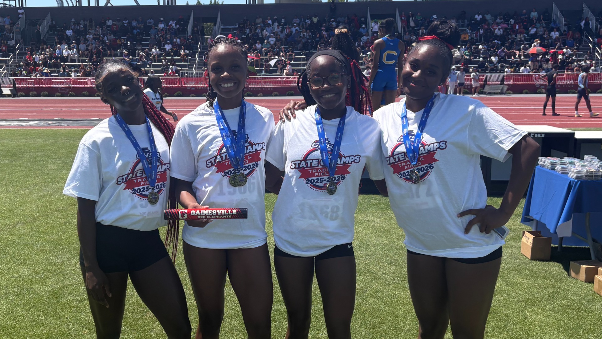 Slide 2 - STORY: Girls track runs in to GHS history books at state meet