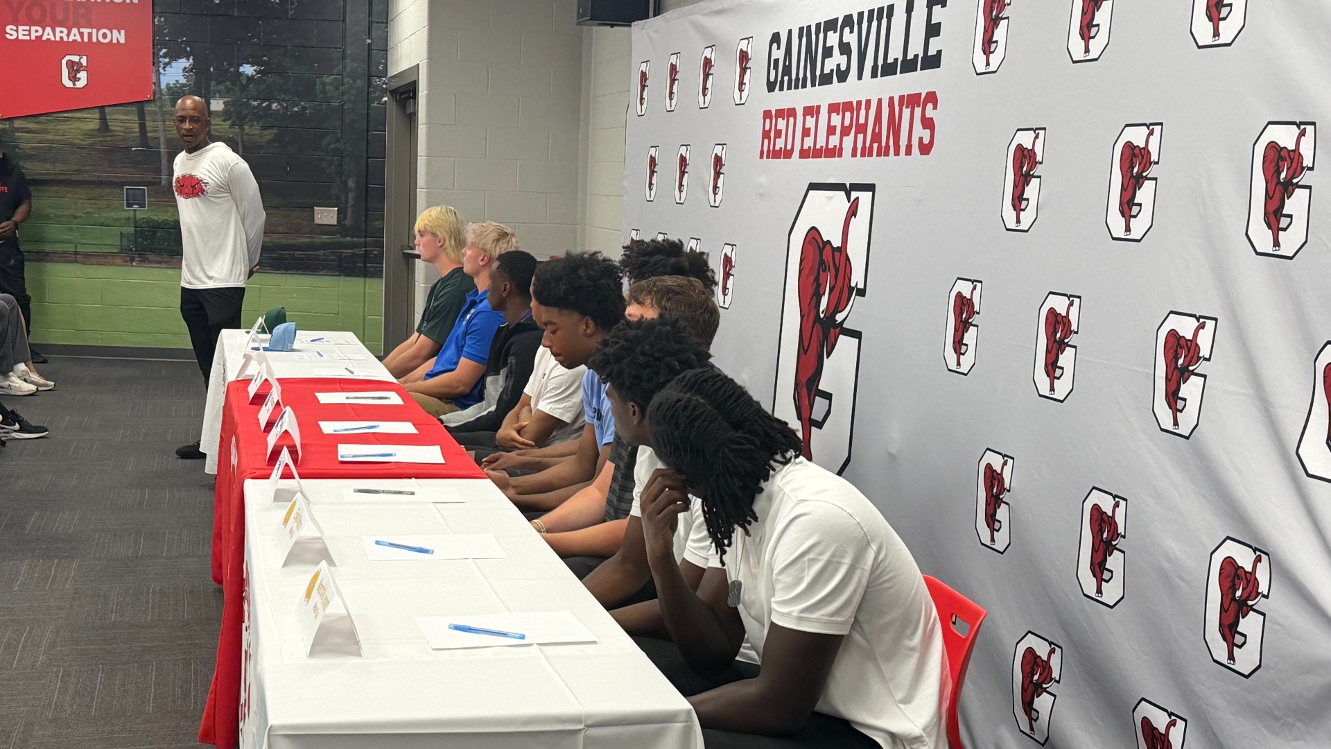 Slide 0 - STORY: Herd of GHS student athletes sign to play at next level