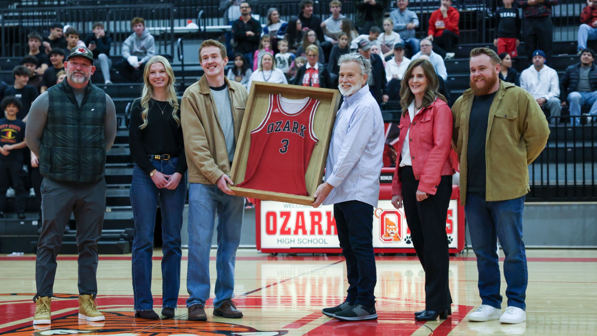 Slide 4 - Ozark Great Quinn Nelson's Jersey Retirement