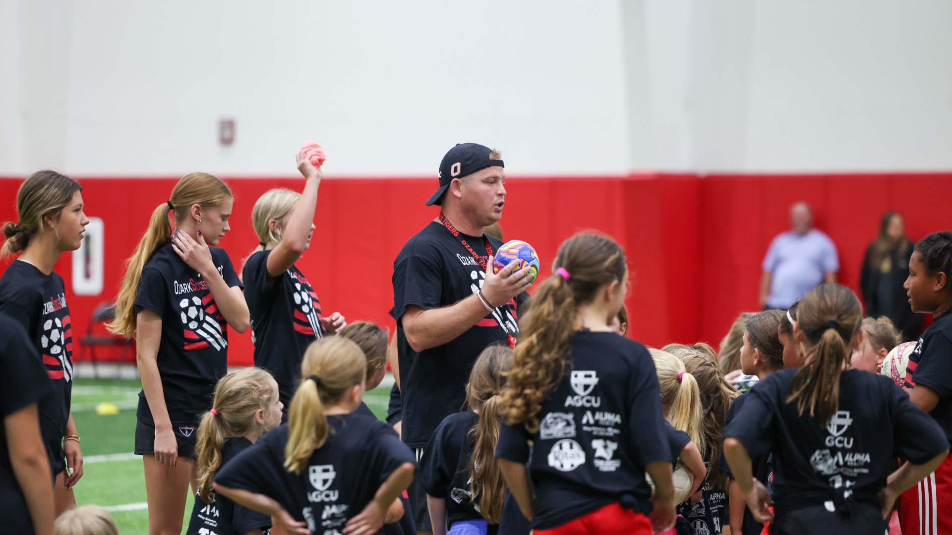 Slide 1 - Ozark Girls Soccer hosts their annual summer camp
