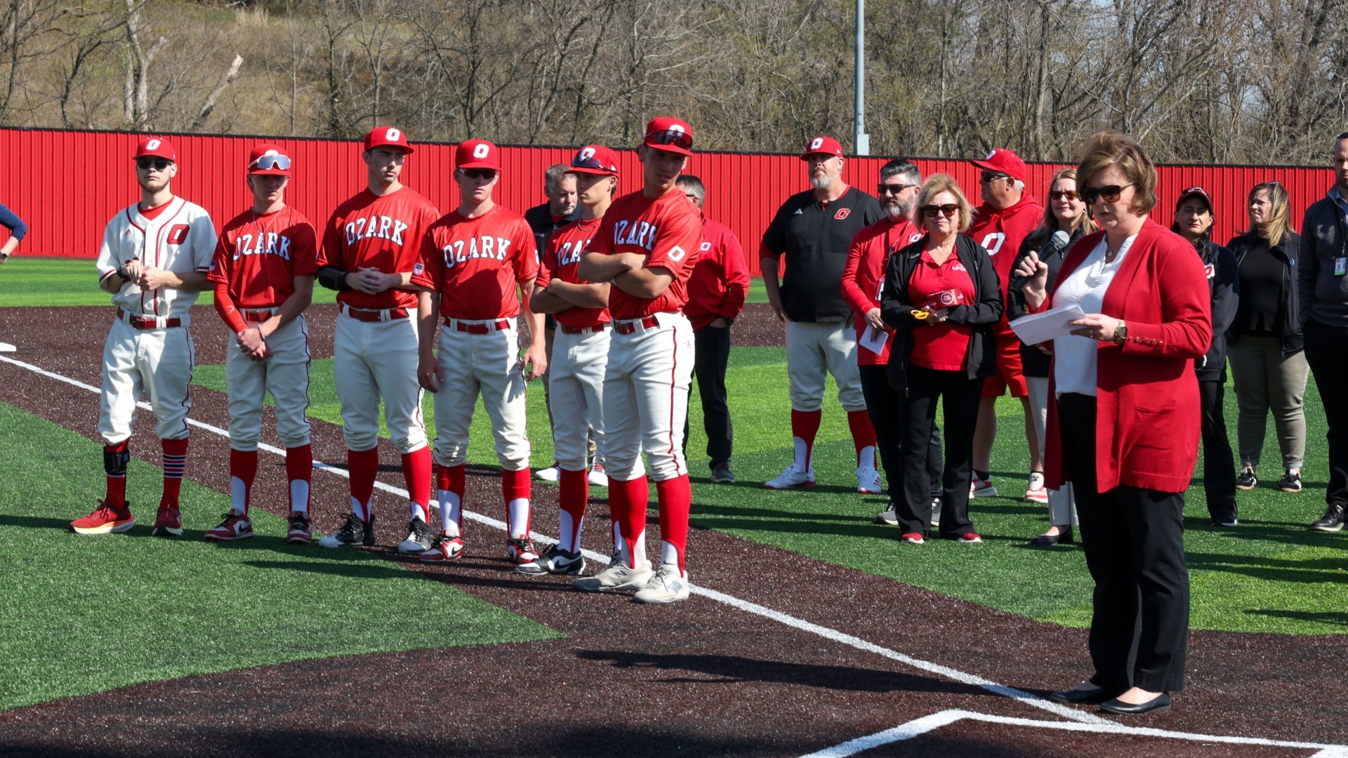 Slide 1 - Ozark School Board President Amber Bryant speaks to the crowd at the Ribbon Cutting Ceremony at the new Baseball Stadium