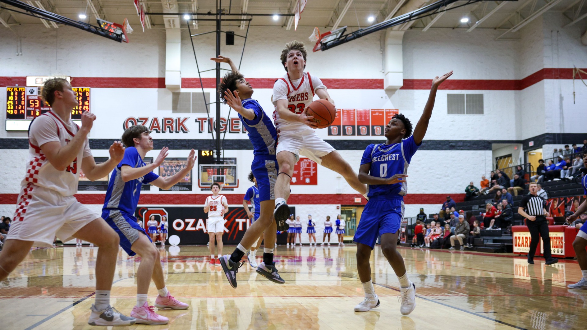 Slide 5 - Junior guard #33, Kylan Pickren, en route to a 40-point game and joining the 1,000-point club vs Hillcrest December 16th, 2025. Photo by Maya Gonzval