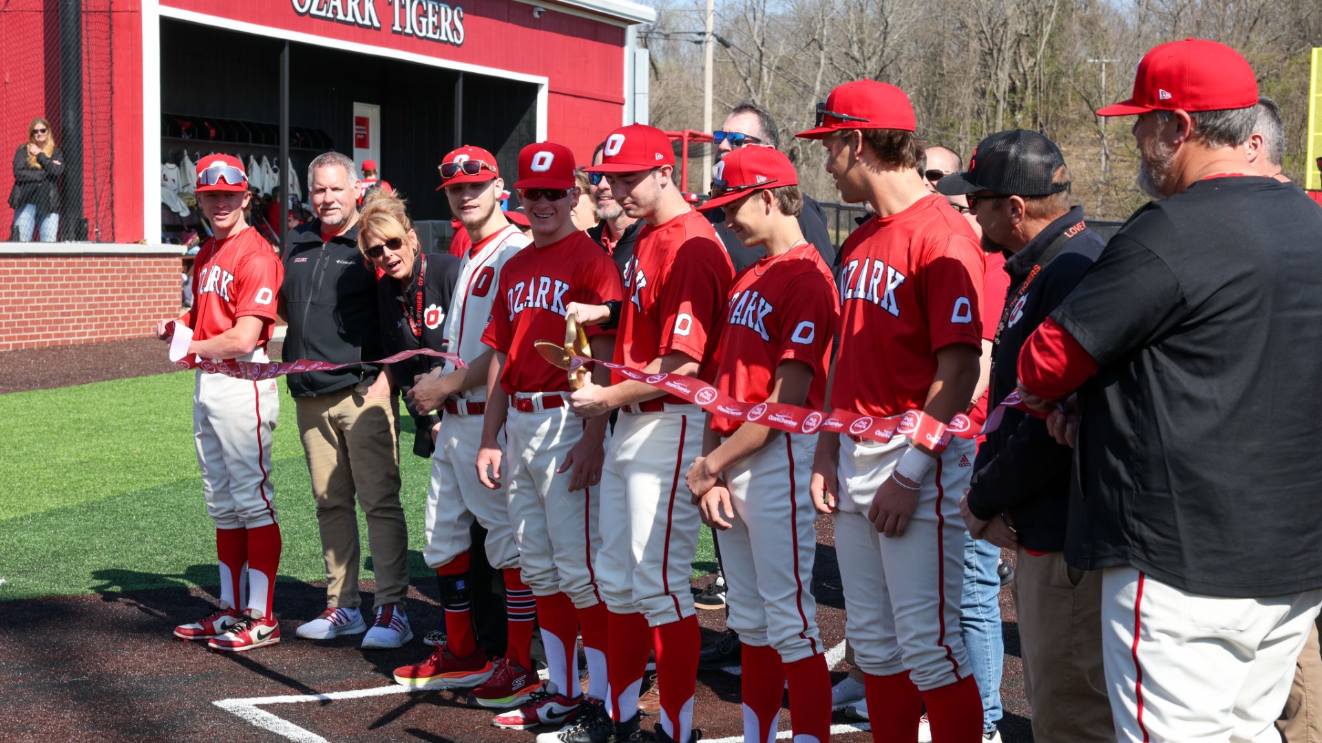 Slide 0 - Cutting of the Ribbon by Ozark Baseball Seniors