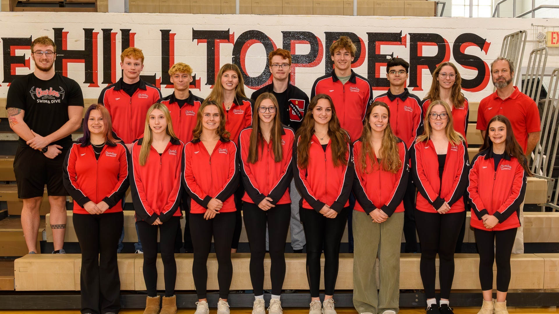 Slide 2 - Varsity Swimming