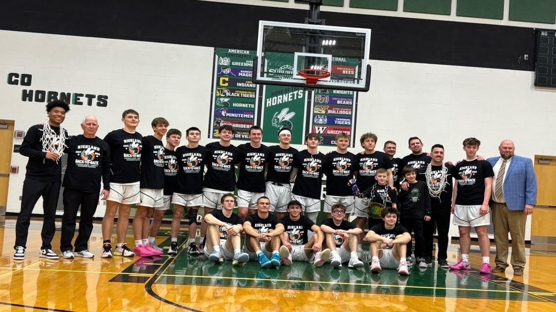 Boys basketball team photo after their win over Aurora.
