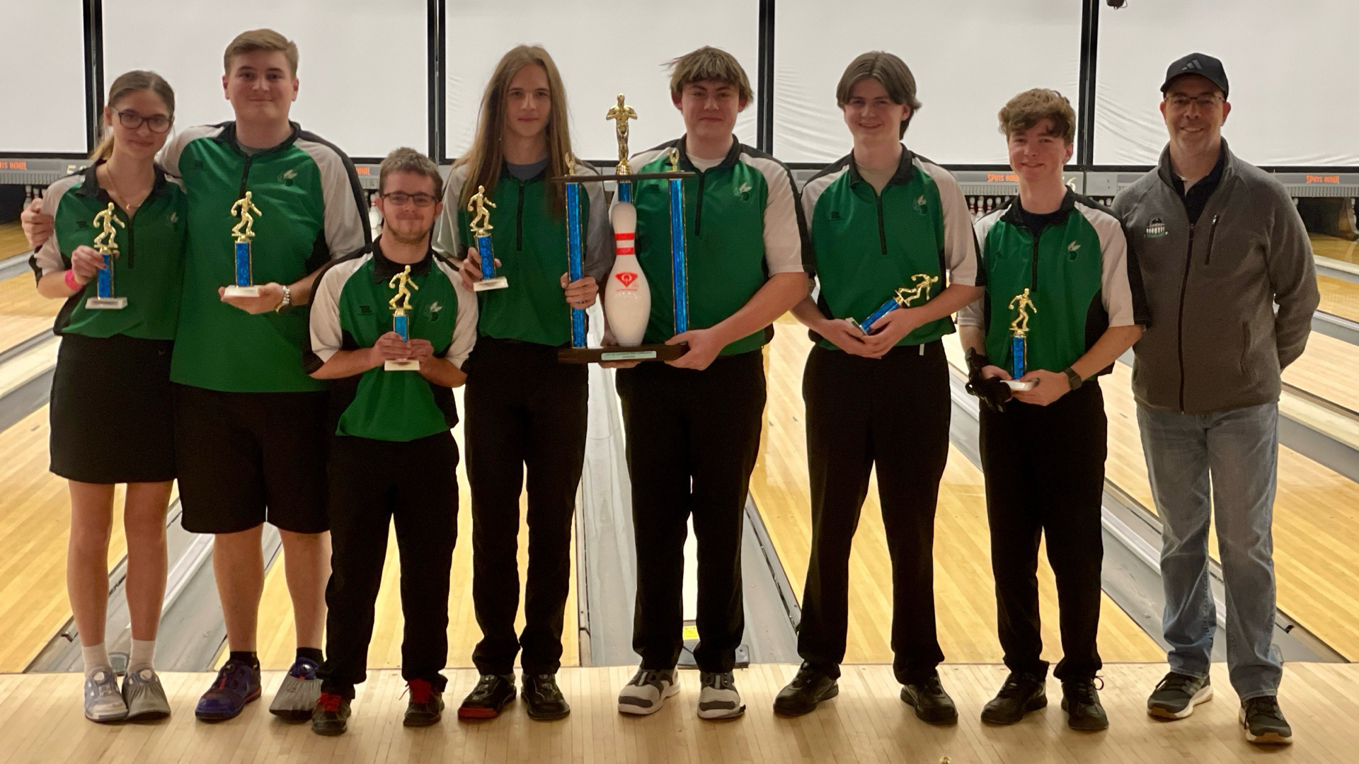 Slide 2 - Varsity Bowling Captures Crown at Super Bowling Bash!