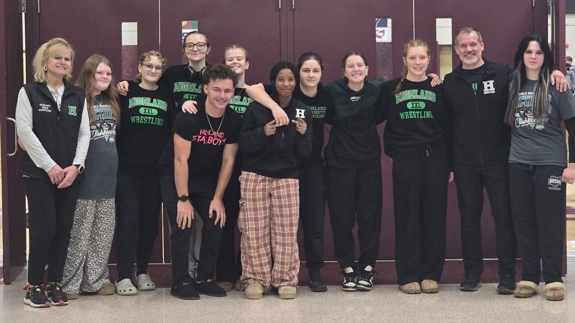 team girls wrestling photo after sectionals on 2-28-2026