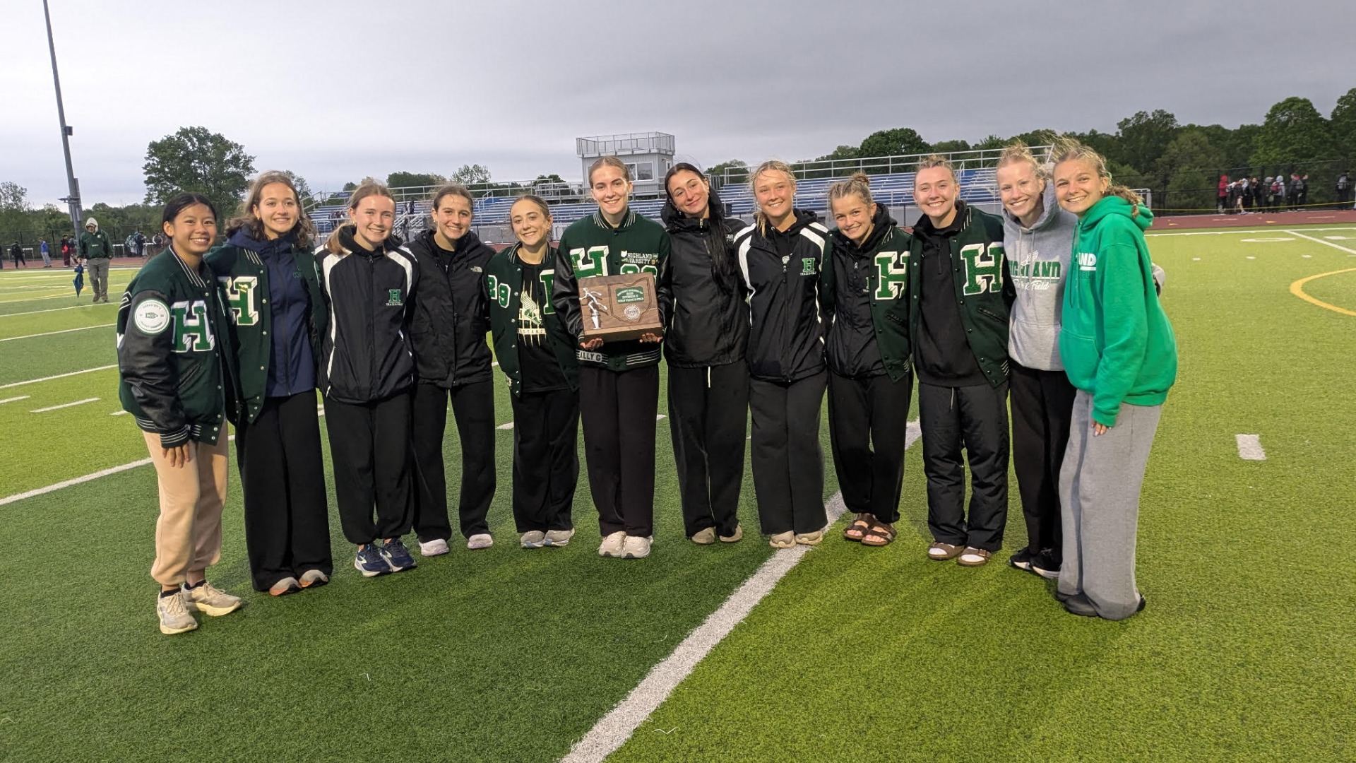 2026 Div. 2 District Runners Up (Tallmadge H.S.) photo of the girls track team after taking second place