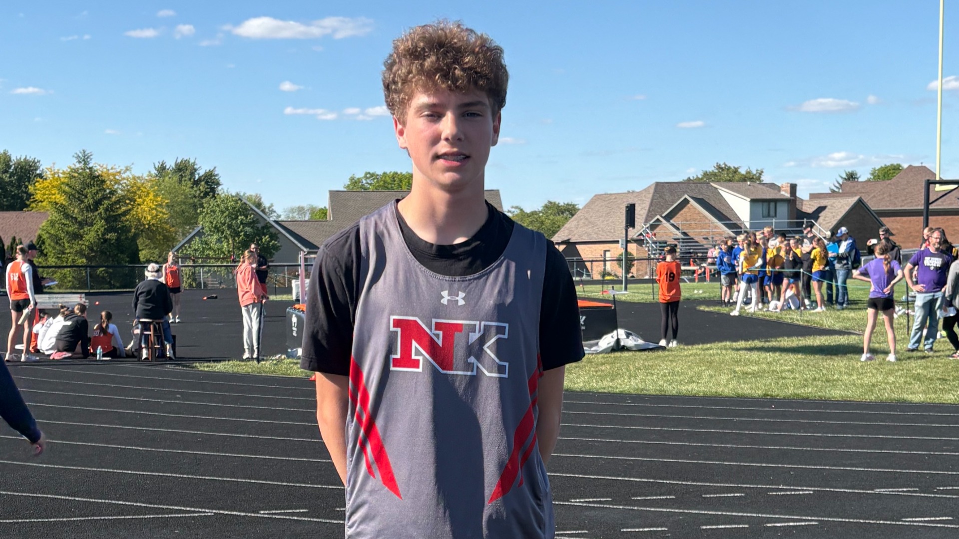 Slide 0 - Rutschilling Sets New MAC JH Track High Jump Record at 6'!
