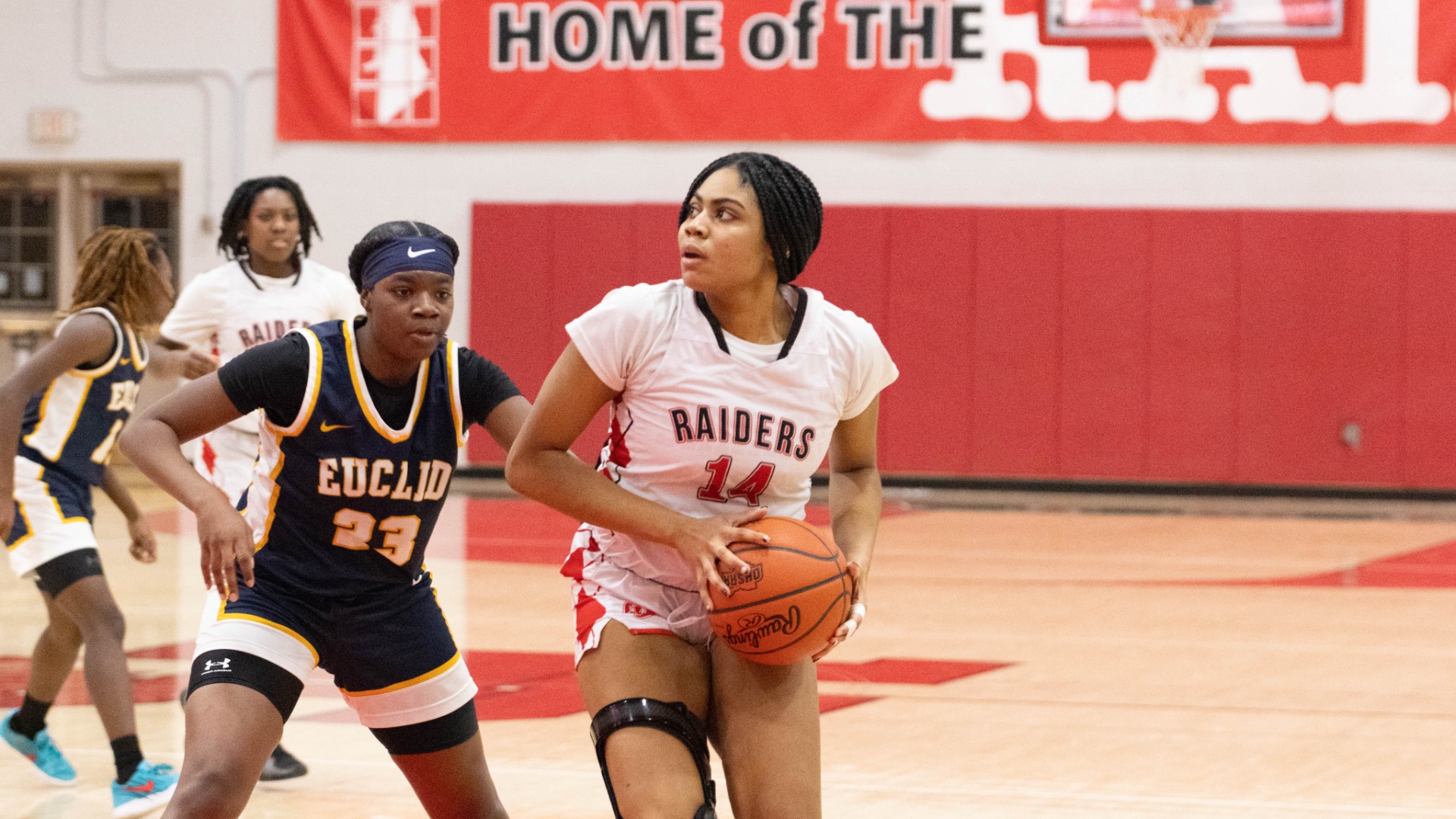 Girls Baketball Protecting the Ball 