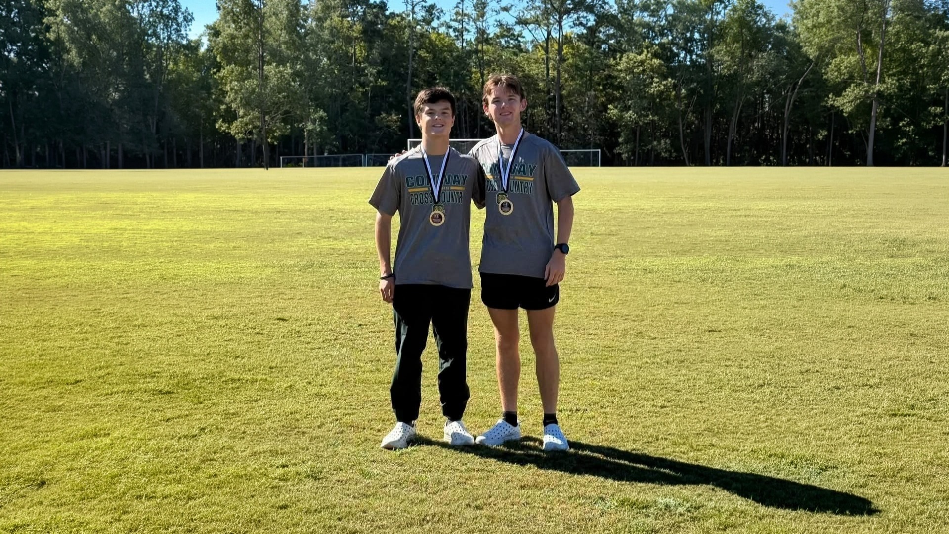 picture of 2 male cross country runners, Coleman and Inabnit