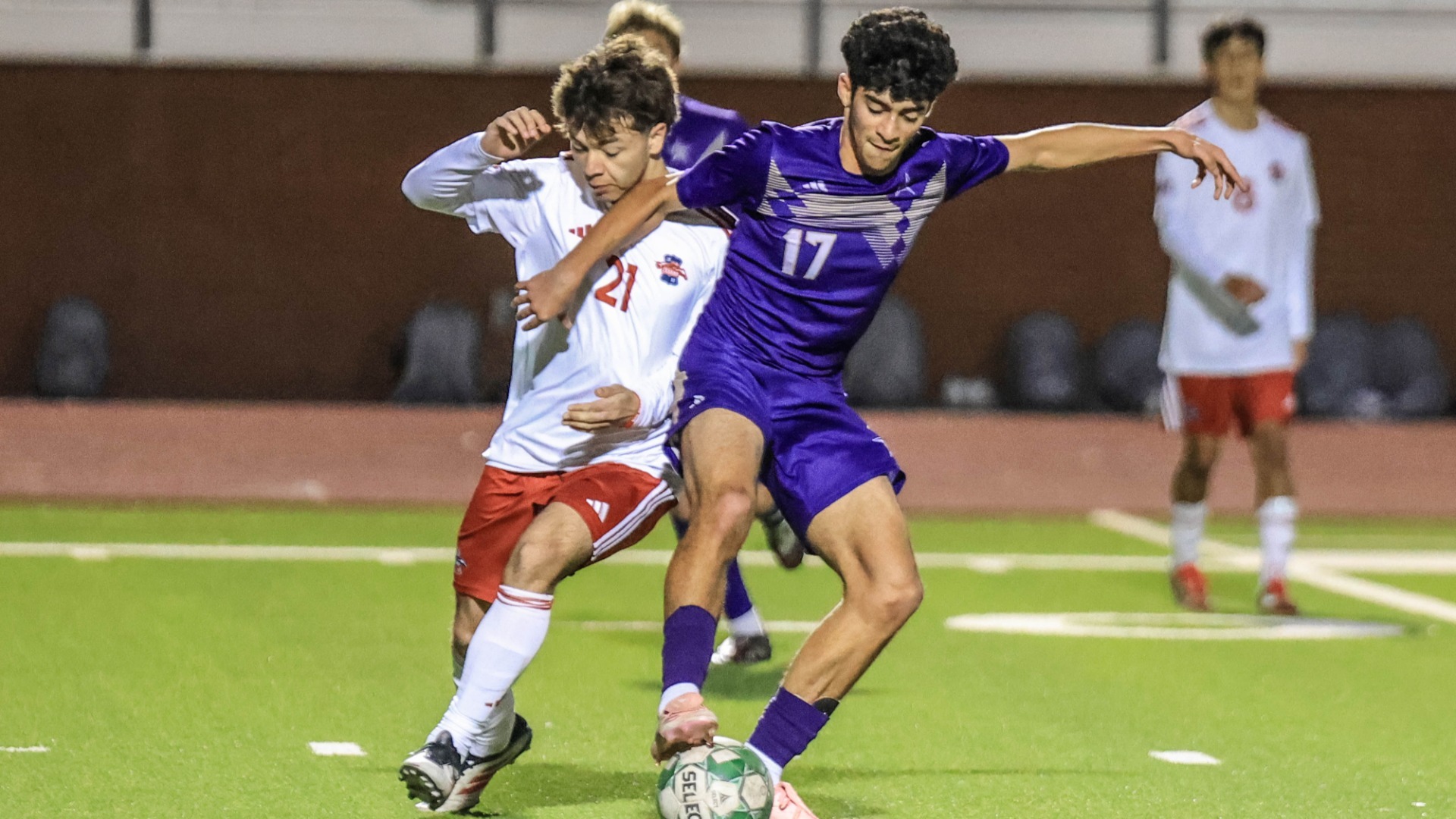 Slide 4 - CHISHOLM TRAIL DUKES IT OUT AGAINST NORTHWEST